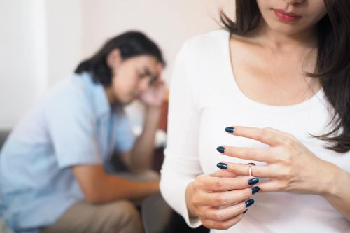 Divorce. Asian couples are desperate and disappointed after wife asks husband for a divorce. Visual concept for legal blog on divorce.