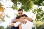 Undocumented Latino Father Hugging his Two Children - BartonWood