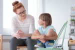 Young Boy Talking to Woman Guardian ad Litem - BartonWood