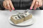 Cut money on plate
